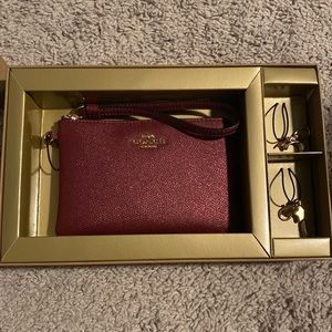 Coach Sparkly Maroon Wristlet with Goldtone charms